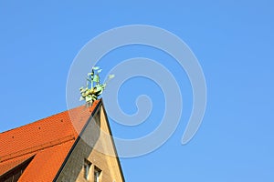 Green ship ornament on an orange roof, Neuhauser Street, Munich MÃÂ¼nchen, Bavaria Bayern, Germany Deutschland photo
